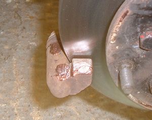 Copper grease on brake pad surfaces