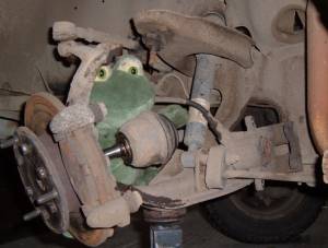 Suspension disassembled to change balljoint